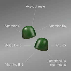 Gommose verdi con i loro componenti: aceto di mele, vitamine C, B6 e B12, aci...